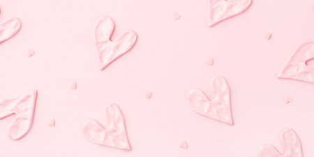 Valentine's day concept. Pink hearts on pink background.