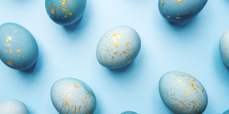 Easter background of eggs painted in blue color.の写真素材