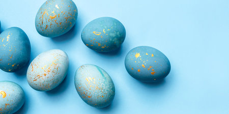 Easter background of eggs painted in blue color. Flat lay, top view.の写真素材