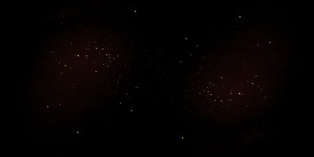 Golden abstract bokeh on black background. Holiday concept
