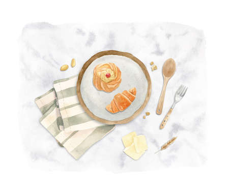 baking illustration - plate with fresh pastry - croissant on a tea towelの写真素材