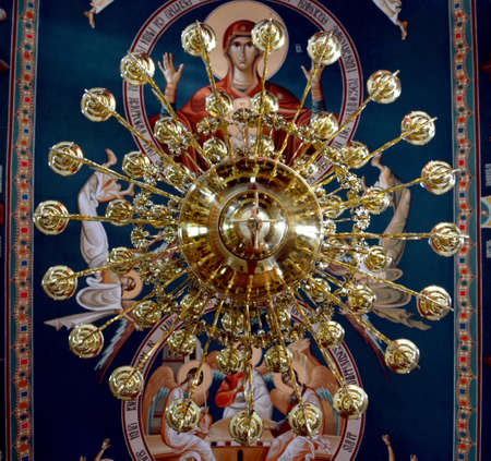 brass chandelier inside a Orthodox Church in Timisoara Romaniaのeditorial素材