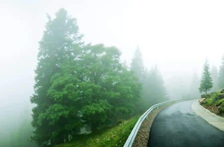 view of the transrarau road in the mountains in a cloudy dayの写真素材