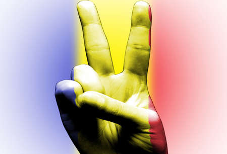 v sign hand painted with romanian flag over the romania flag