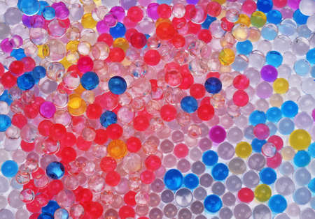 transparent colored water balls texture close upの写真素材