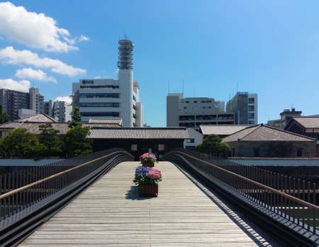 Nagasaki, Japan - 13.06.2018: restored bridge with NIB television building architectureのeditorial素材