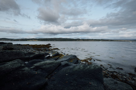 Panoramic view of the rocky shores and forests of a small village Ardrishaig. Loch Fyne, Crinan canal, Argyll and Bute, Scotland, UKの写真素材