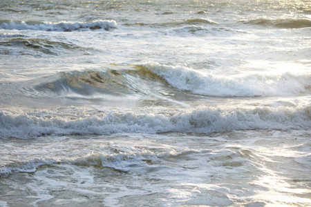 Baltic sea after a thunderstorm at sunset. Ventspils, Latvia. Waves and water splashes. Epic...