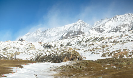 Snow-covered mountain peaks of French Alps. France, Europe. No people, coronavirus (COVID-19) outbreak, lockdown, closed borders, quarantine. Winter, Christmas vacations, tourism, winter sport, skiの写真素材