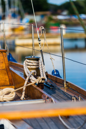 Winch close-up, a fragment of the wooden sailboat. Port of Riga, Latvia