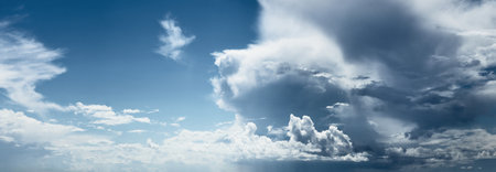 Epic cloudscape. White ornamental cumulus clouds before the rain. Fickle summer weather, Baltic sea....