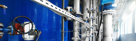 Large industrial water treatment and boiler room. Pressure vessels, piping, armature, butterlfy...