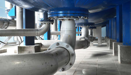 Large industrial water treatment and boiler room. Bottom of large pressure vessels