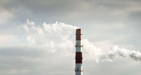 Panoramic view of the large central heating station in dramatic light. Pipe close-up. Ecology,...