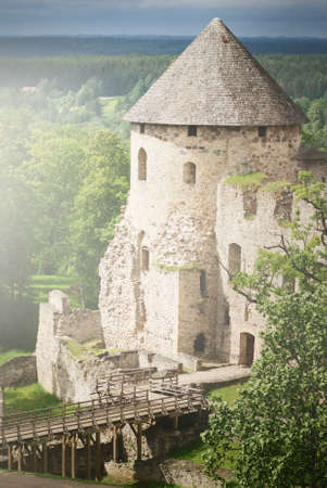 Cesis medieval castle ensemble, tower and spire close-up. Picturesque panoramic aerial view. Travel destinations, architecture, national landmarks, culture, history, vacations in Latvia, Europeの写真素材