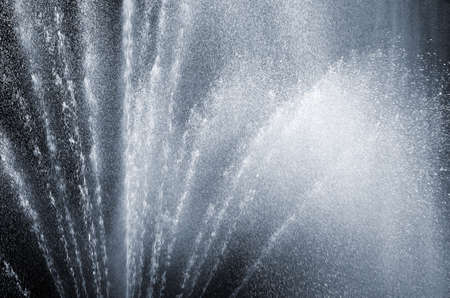 fragment of fountain water drops in the airの写真素材