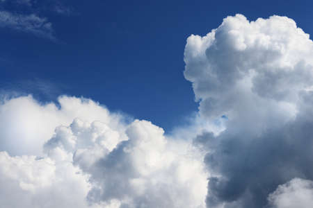 classic cloudscape. Blue sky with ornamental cloudsの写真素材