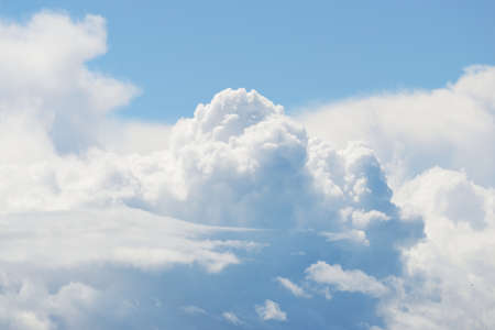 classic cloudscape. Blue sky with ornamental clouds