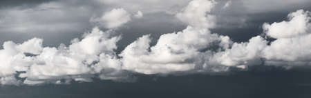 Dark ornamental clouds. Dramatic sky. Epic storm cloudscape. Panoramic image, texture, background, graphic resources, design, copy space. Meteorology, weather, thunderstorm. hurricane conceptsの写真素材