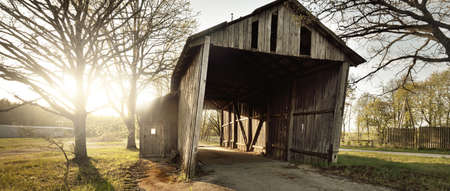 An old abandoned rustic wooden shed, close-up. Agriculture, farm industry, traditional architecture,...