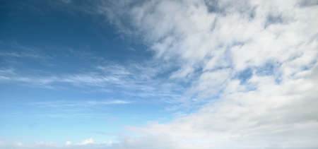 Clear blue sky after the storm. Soft sunlight. Panoramic image, texture, background, graphic...