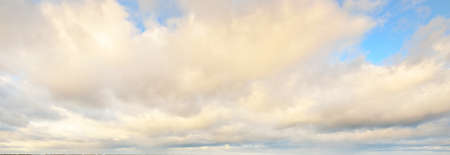 Ornamental clouds. Dramatic sky. Cloudscape. Soft sunlight. Panoramic image, texture, background,...