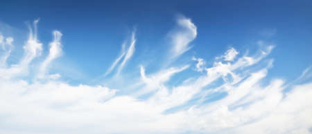 Coudscape. White ornamental clouds. Soft sunlight, sunbeams. Clear blue sky. Natural pattern,...