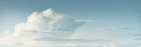 Ornamental clouds. Dramatic sky. Epic storm cloudscape. Soft sunlight. Panoramic image, texture,...