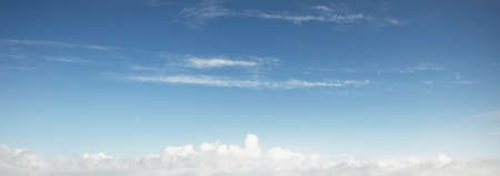 Clear blue sky after the storm. Soft sunlight. Panoramic image, texture, background, graphic...