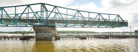 Swing bridge near RidÃ¶n island, MÃ¤laren lake, Sweden. Panoramic view from a sailing boat. Construction, transportation, navigationの写真素材