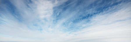 Ornamental clouds. Dramatic sky. Soft sunlight. Panoramic image, texture, background, graphic...