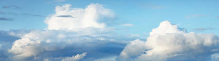 Ornamental clouds. Dramatic sky. Epic storm cloudscape. Soft sunlight. Panoramic image, texture,...