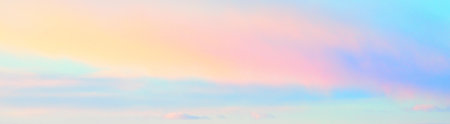Clear sky, glowing cirrus and cumulus clouds after the storm, soft sunlight. Dramatic sunset cloudscape. Meteorology, weather, climate, heaven, peace. Graphic resources. Picturesque panoramic sceneryの写真素材