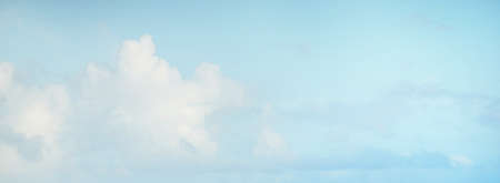 Ornamental clouds. Dramatic sky. Epic storm cloudscape. Soft sunlight. Panoramic image, texture,...