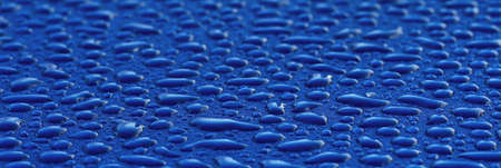 Bright blue background, crystal clear drops (raindrops). Abstract pattern, wallpaper, concept art. Glitter, paint texture. Graphic resources, design, 3D, macrophotography, environment, water treatmentの写真素材