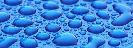 Bright blue background, crystal clear drops (raindrops). Abstract pattern, wallpaper, concept art....