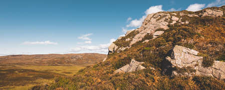 Panoramic view of the valleys hills and rocky shores of Isle of Islay. Inner Hebrides, Scotland, UK....