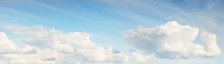 Clear blue sky with glowing clouds. Soft sunlight. Dramatic cloudscape. Concept art, meteorology,...