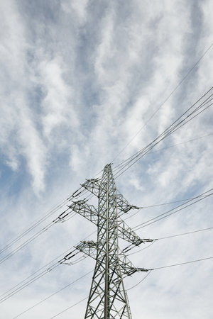 Electricity power line. Dramatic sky. Concept urban landscape. Energy, power generation, equipment,...