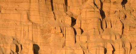 Panoramic view of the red sandstone canyon (quarry) at sunset. Atmospheric landscape. Travel...