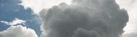 Ornamental clouds. Dramatic sky. Epic storm cloudscape. Soft sunlight. Panoramic image, texture,...