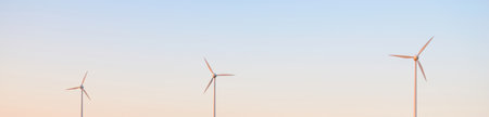 Wind turbine generators, sunset sky. Concept image, graphic resources, ecology, alternative energy...