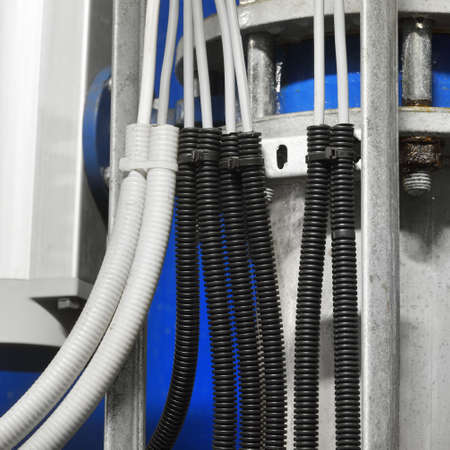 Industrial water treatment and boiler room. Shiny steel metal pipes, piping, connections. Industry,...
