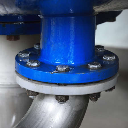 Industrial water treatment and boiler room. Shiny steel metal pipes, piping, connections. Industry,...