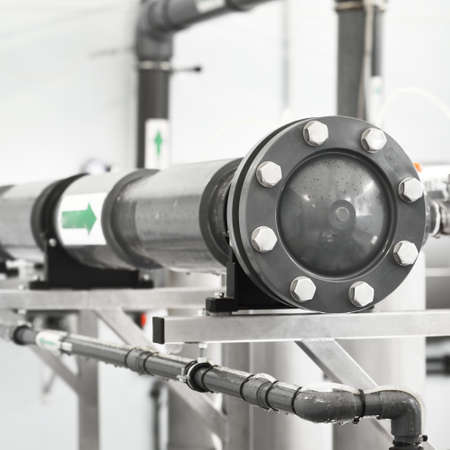 Industrial water treatment and boiler room. Pipes, piping, levers, barometers, connections....