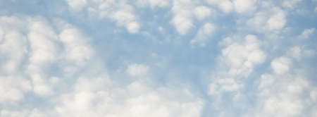 Coudscape. White ornamental clouds. Soft sunlight, sunbeams. Clear blue sky. Natural pattern,...