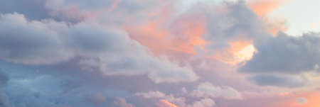 Clear blue sky with glowing clouds. Soft sunlight. Dramatic cloudscape. Concept art, meteorology,...