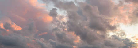 Clear blue sky with glowing clouds. Soft sunlight. Dramatic cloudscape. Concept art, meteorology, heaven, peace, graphic resources, picturesque panoramic sceneryの写真素材