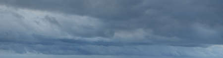 Dark ornamental clouds. Dramatic sky. Epic storm cloudscape. Panoramic image, texture, background,...