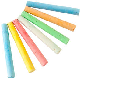 Colored chalk on a white background in the form of rays, isolated